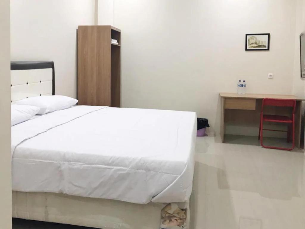 The Galton Hotel Baubau Bagian luar foto
