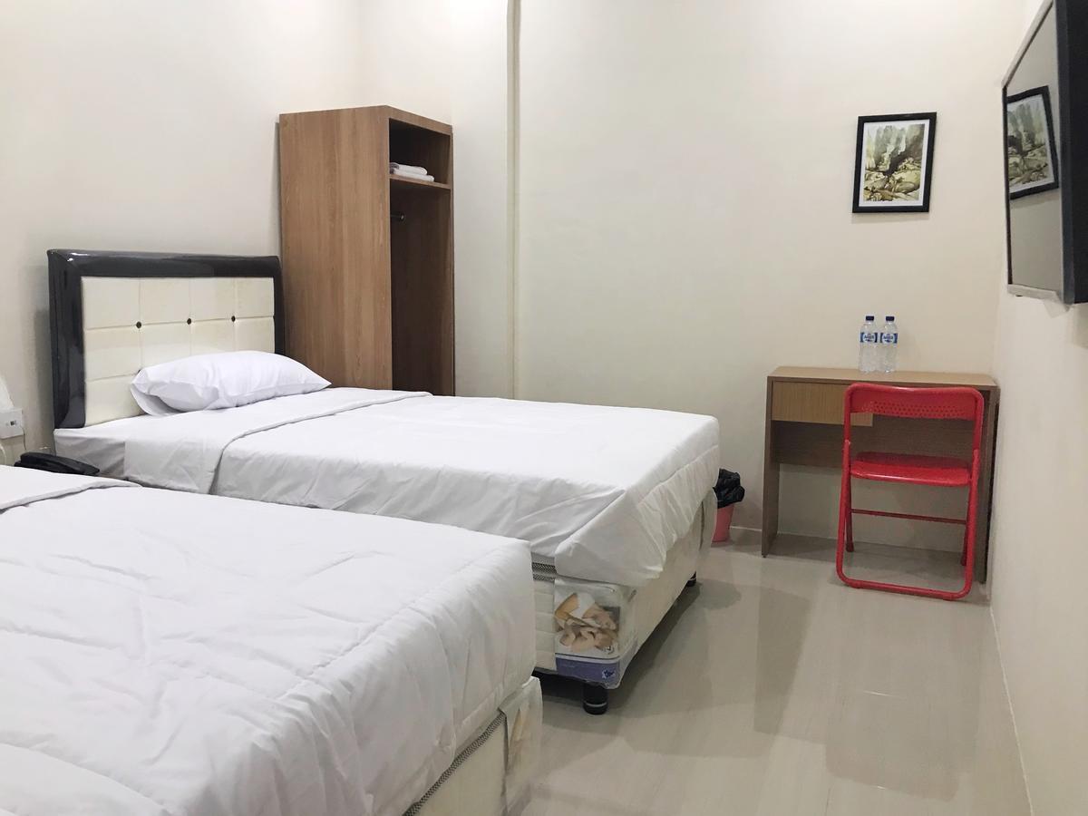 The Galton Hotel Baubau Bagian luar foto